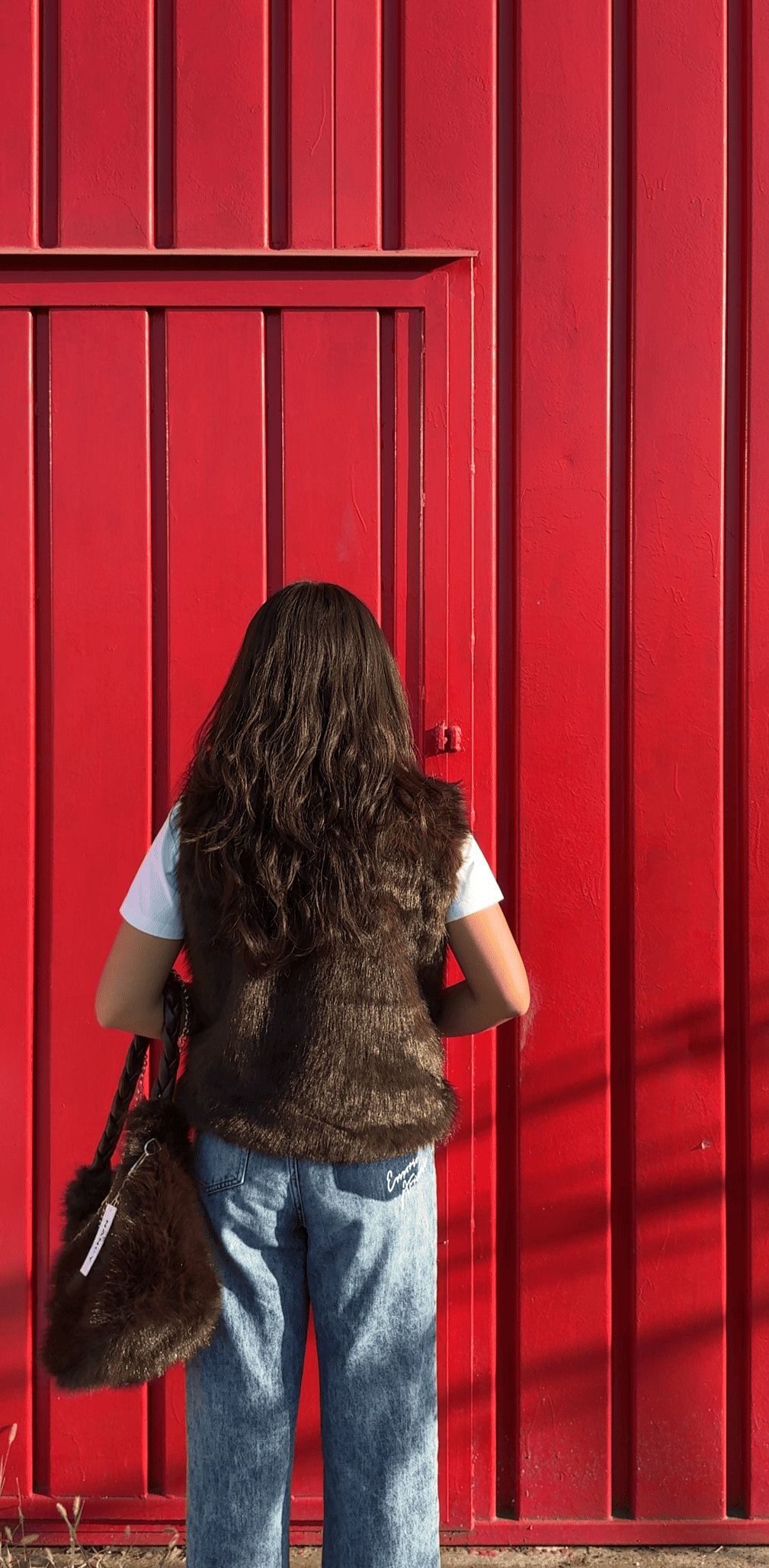 Gilet in ecopelliccia con colletto