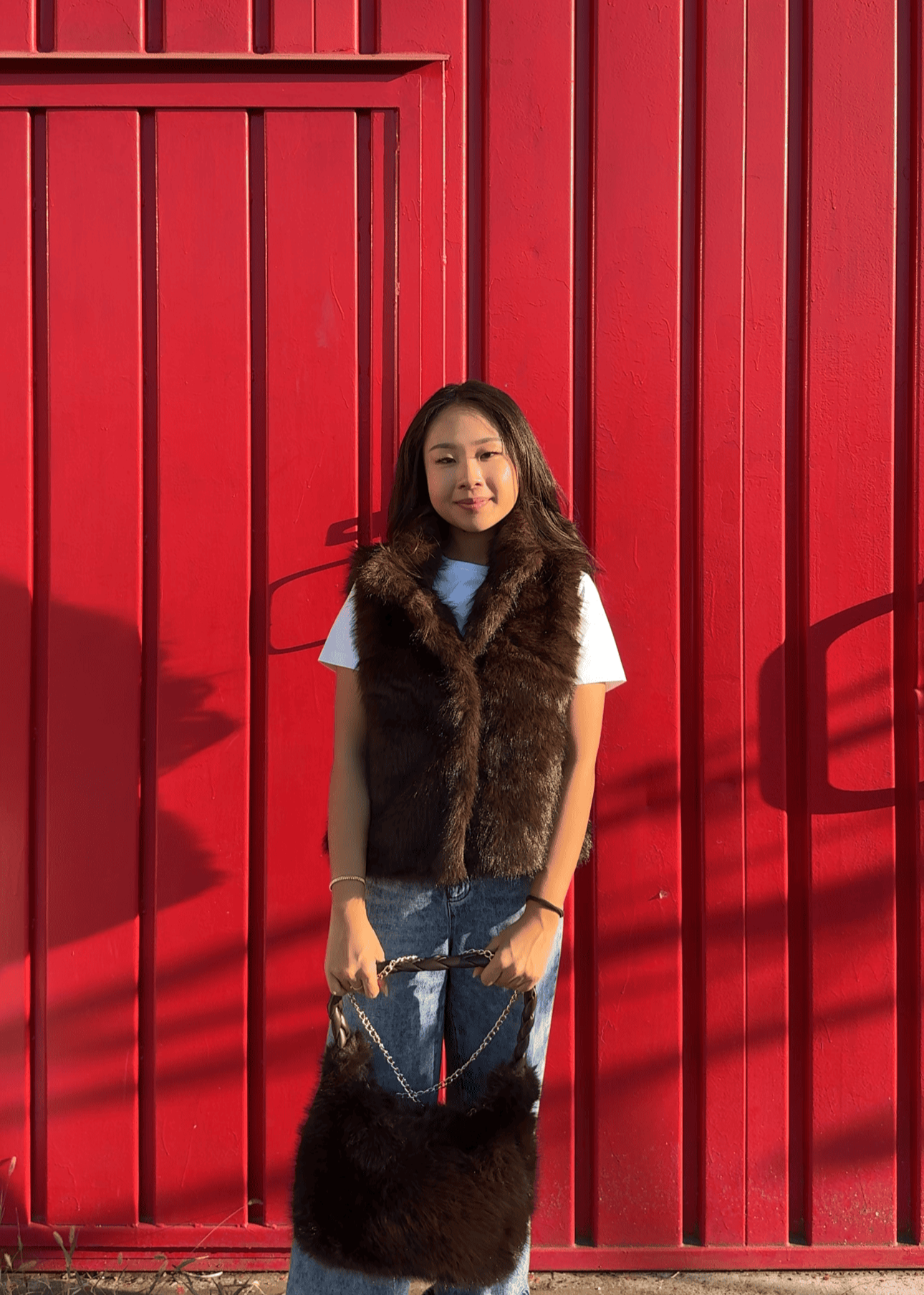 Gilet in ecopelliccia con colletto